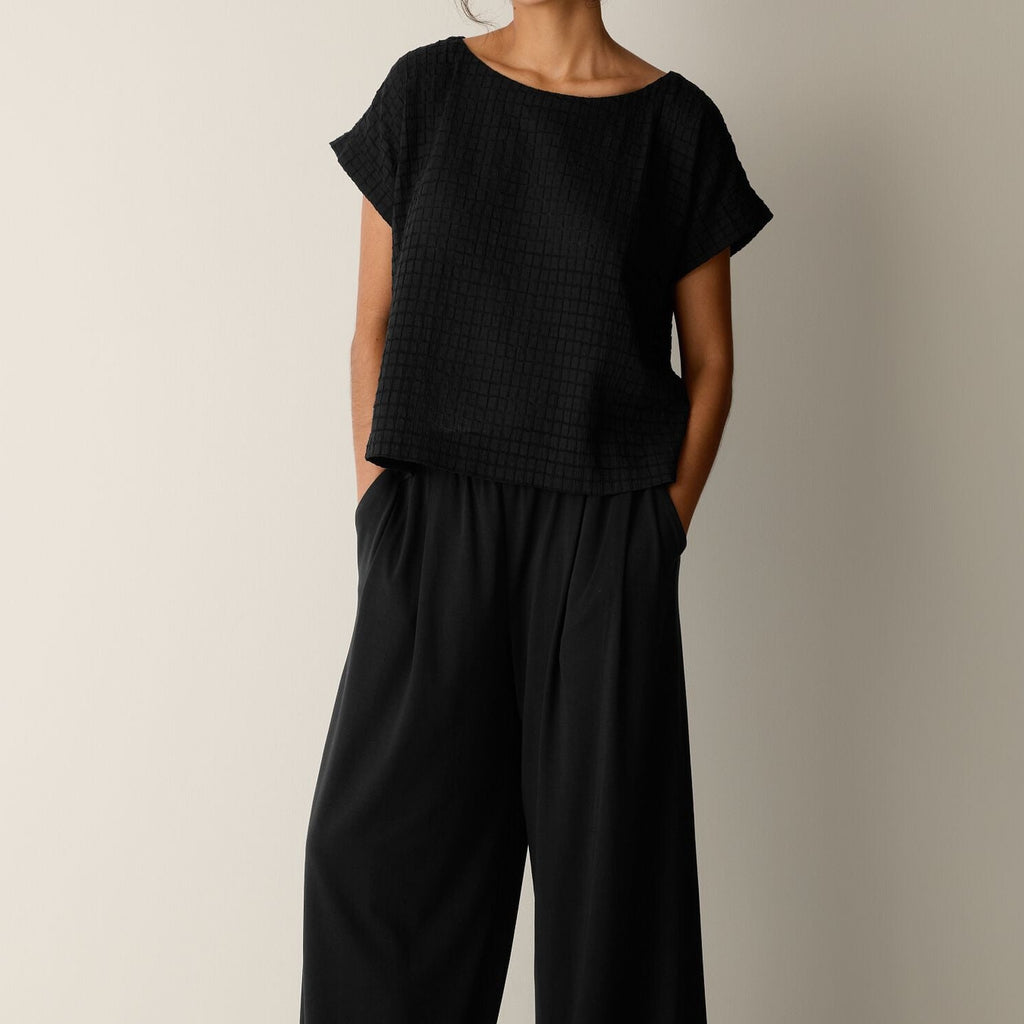 Women's black relaxed fit short sleeve top