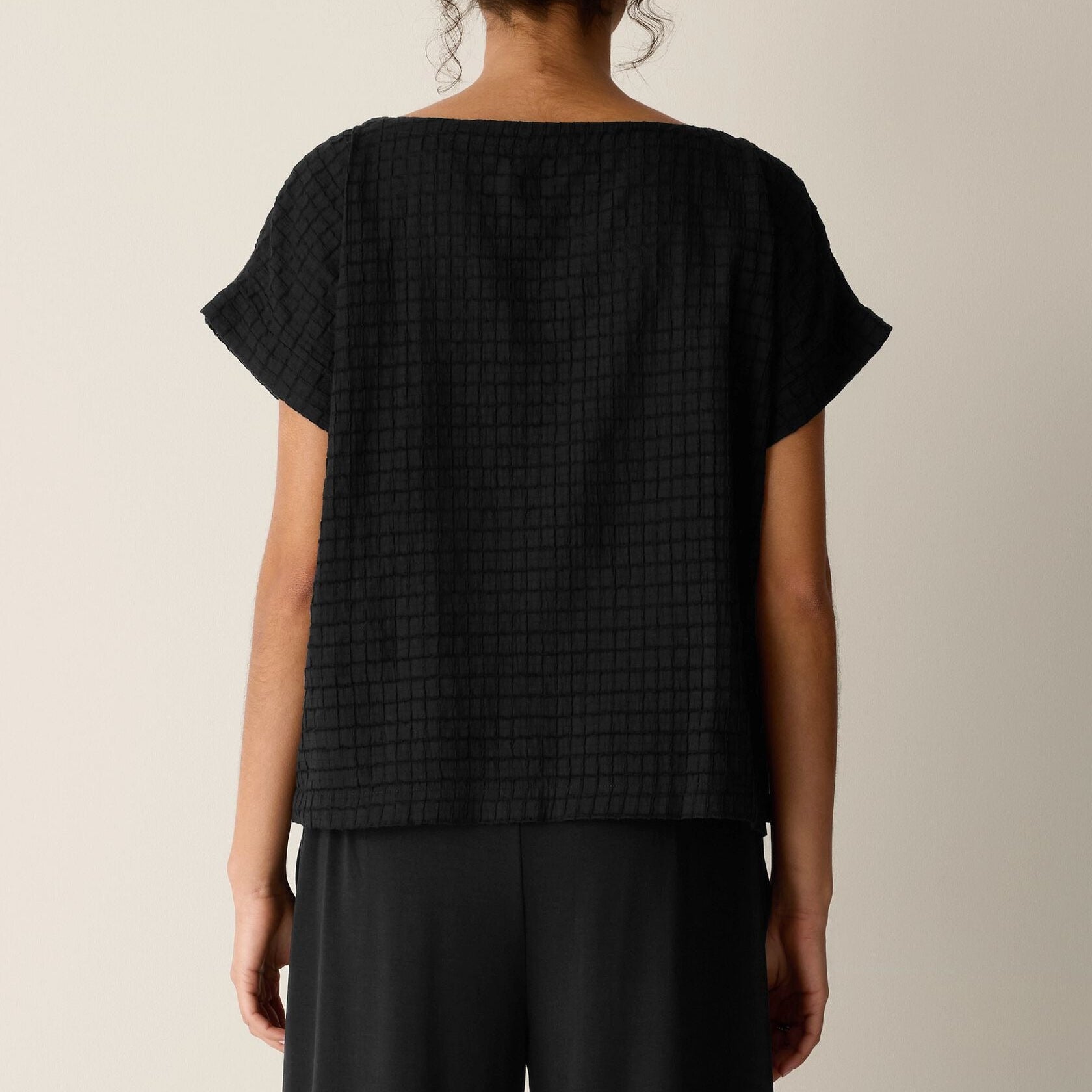 Women's black relaxed fit short sleeve top