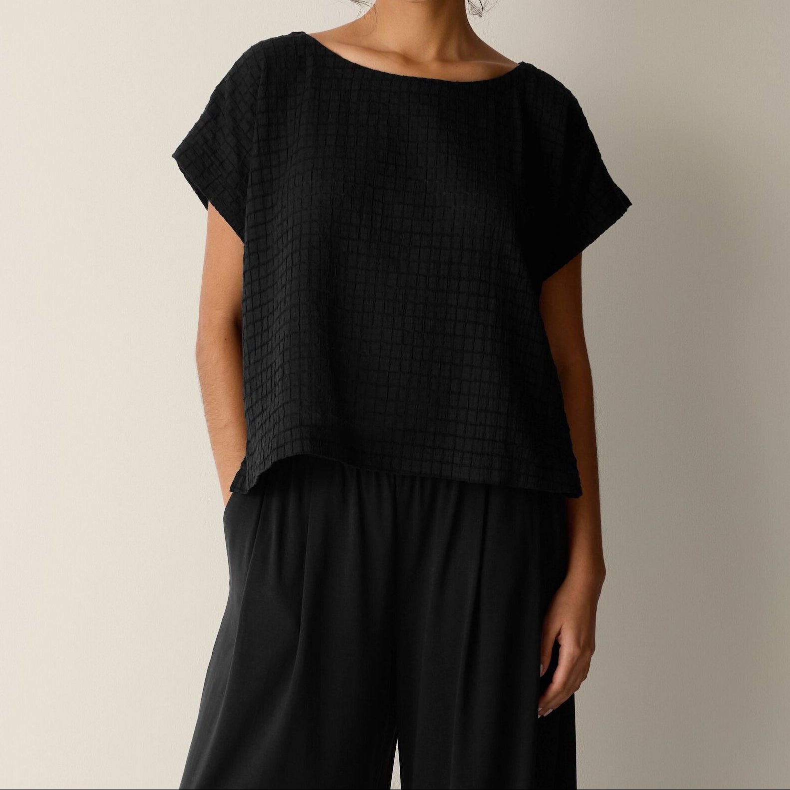 Women's black relaxed fit short sleeve top