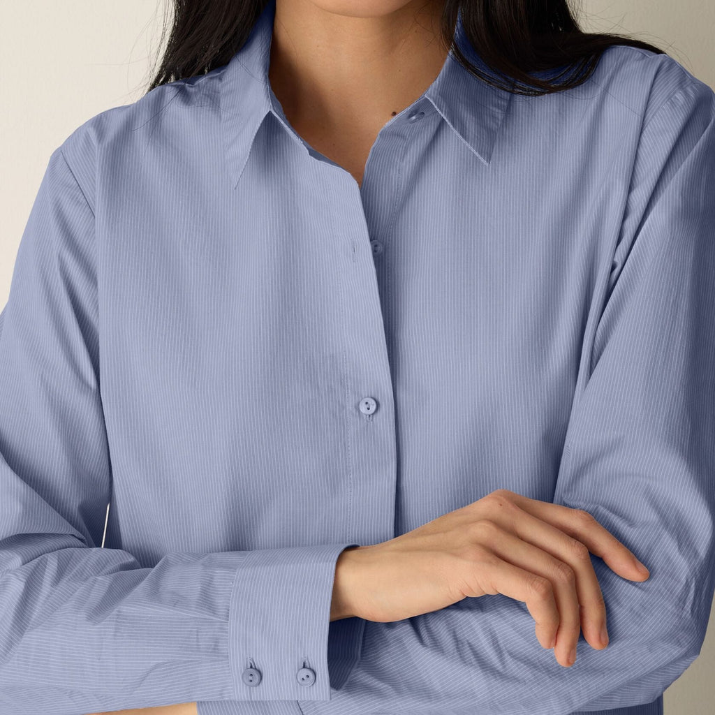 Women's blue long sleeve collared shirt