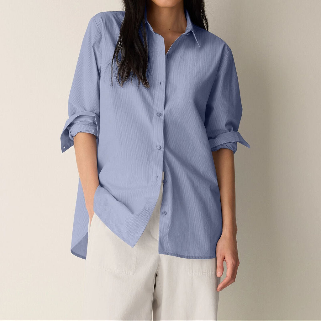 Women's blue long sleeve collared shirt